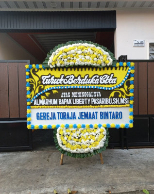 Papan Bunga Duka di Pendalian Iv Koto